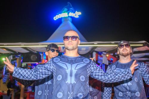 a group of men dressed up in costumes at a carnival at Orka World Hotel & Aquapark in Oludeniz