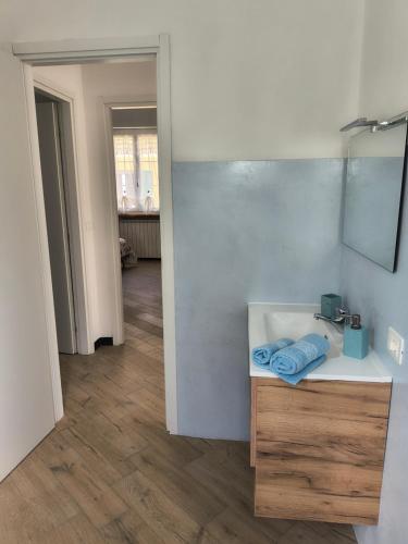 a bathroom with a sink and a mirror at L'Eden in Casarza Ligure