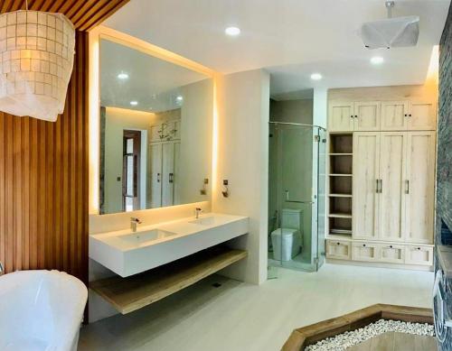 a bathroom with a sink and a shower at Brio de Agoho in Candelaria