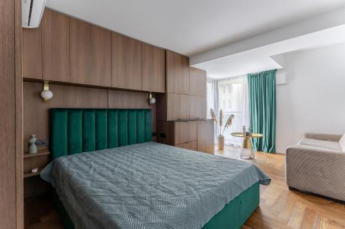 Llit o llits en una habitació de Emerald Coast Studio