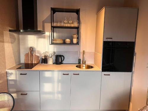 Foto Luxe Tiny Suite met privé tuinbad 1