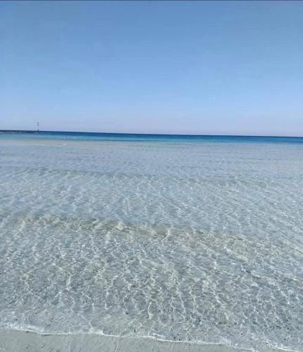 a large body of water with the shoreline at DIADEMA Luxury Suite in Nardò
