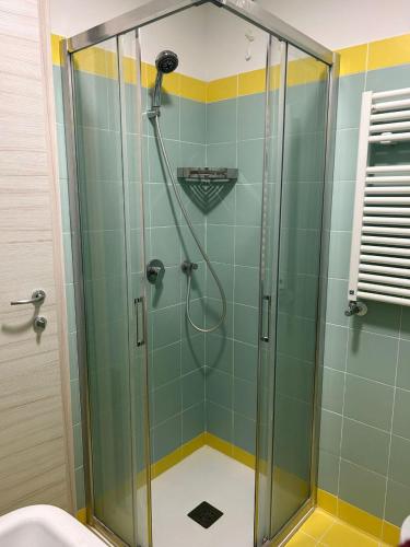 a shower with a glass door in a bathroom at Ostello S. Fosca - CPU Venice Hostels in Venice