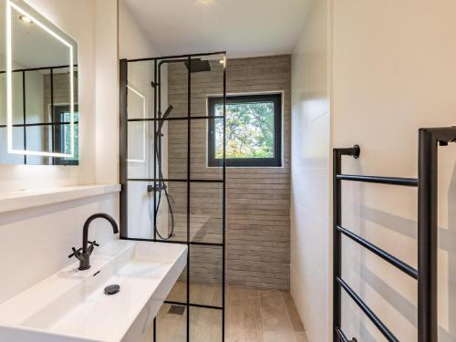 a bathroom with a sink and a shower at 2 Bed in Brecon oc-59734 in Talgarth