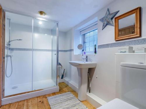 a bathroom with a shower and a sink at 3 Bed in Belper oc-85797 in Crich