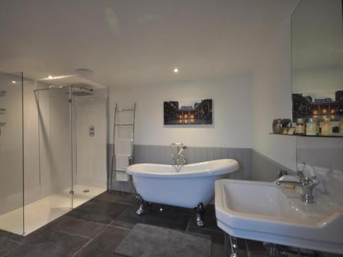 a bathroom with a tub and a sink and a shower at 2 Bed in Bath oc-47045 in Farmborough