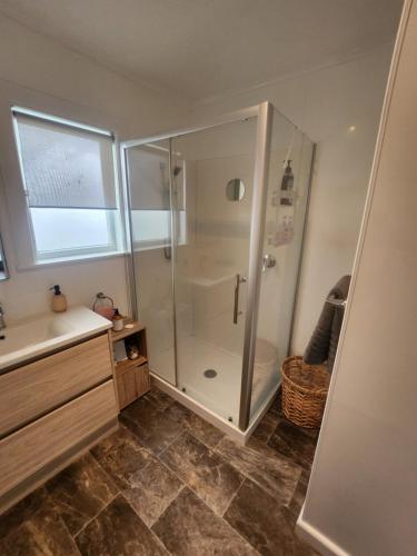 a bathroom with a shower and a sink at Cambridge Oasis in Cambridge