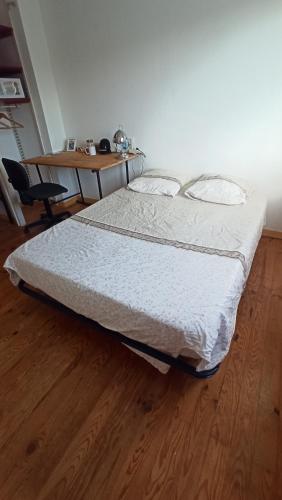 Llit o llits en una habitació de Sega Home