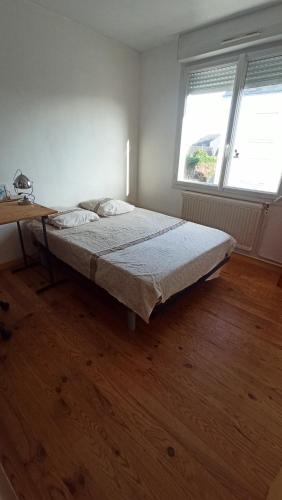 Llit o llits en una habitació de Sega Home