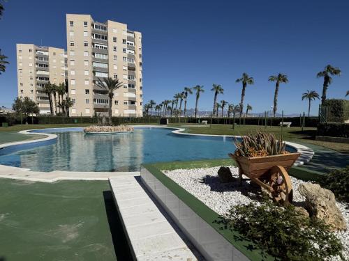 Urbanova primera línea 2 hab con piscina y vistas al mar by Turihome