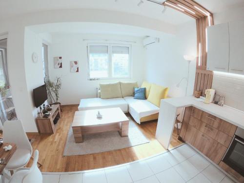 Ruang duduk di Oleander Apartment