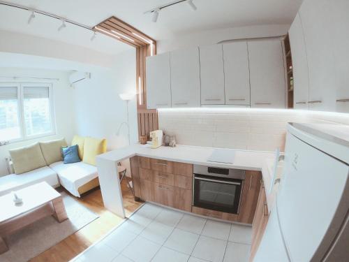 Køkken eller tekøkken på Oleander Apartment