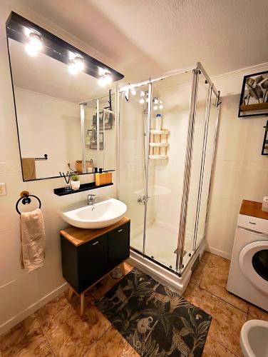 a bathroom with a shower and a sink and a toilet at Bellavista Basement in Costa Del Silencio
