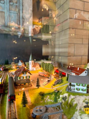 a model of a city with a train and a building at Family Hotel EDI in Sofia