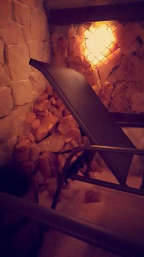 a knife sitting on rocks in a brick oven at Dwór w Zabużu in Zabuże