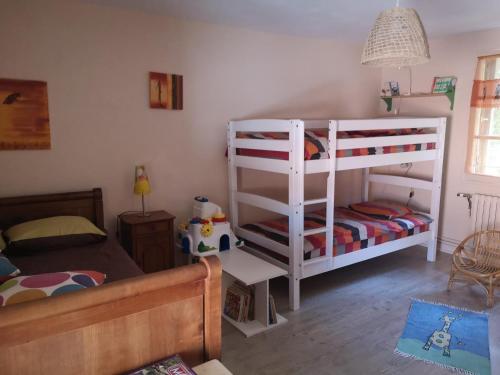 Llit o llits en una habitació de Tin'ida