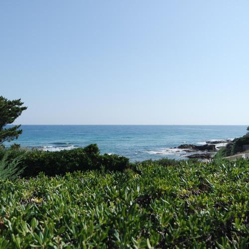 a view of the ocean from the beach at Villa Perle De La Mer in Saint-Aygulf