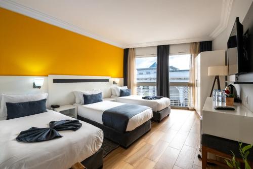 Krevet ili kreveti u jedinici u okviru objekta Hotel Le Musée