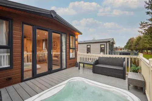 Woodpark Lodge with Hot Tub photo 1