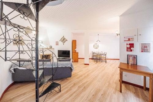 a large living room with a couch and a table at Casas da Biquinha in Sintra