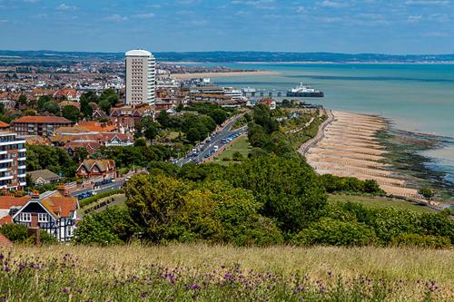 a view of a city with a beach and the water at East Beach Hotel in Eastbourne