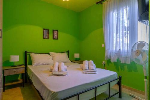 เตียงในห้องที่ Villa ELENA