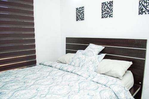 A bed or beds in a room at Loft Smart Mgta