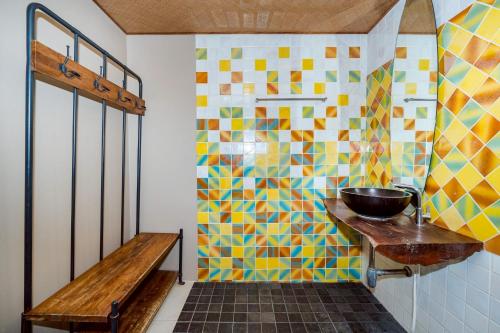 a bathroom with a sink and a bowl on a counter at Let go see the Dolphin Samroiyot in Baanphakrimlay 