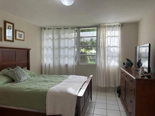 Llit o llits en una habitació de Tropical Escape