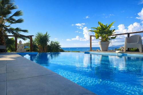 Villa de Luxe Perlane Bay vue mer piscine chauffée