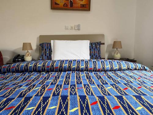 Llit o llits en una habitació de La Maison Dony