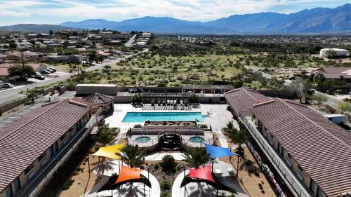 an aerial view of a resort with a swimming pool at RELAX hotel and spa in Desert Hot Springs
