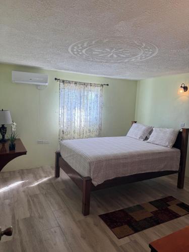 Postel nebo postele na pokoji v ubytování Rawacou Breeze