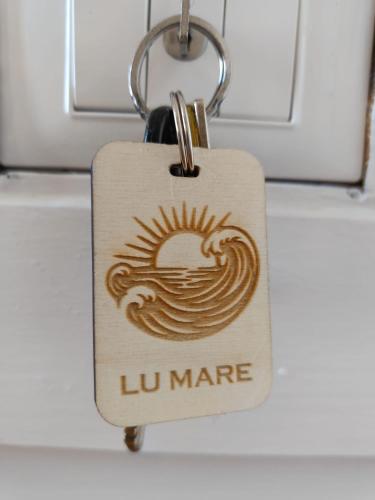 a dog tag with the lu marne on it at B&B Casavecchia in Gallipoli