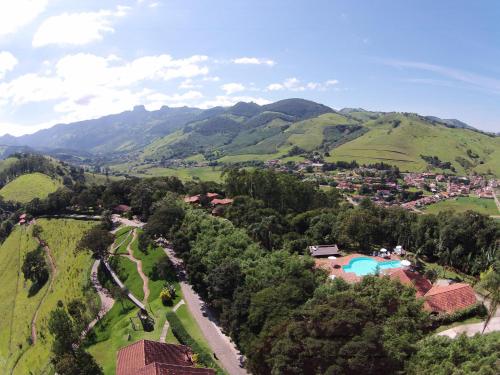 an aerial view of a village in the mountains at Pousada do Quilombo in São Bento do Sapucaí