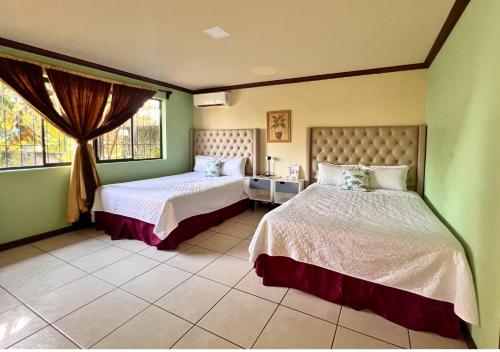Villa Noelia में एक कमरे में एक या कई बेड