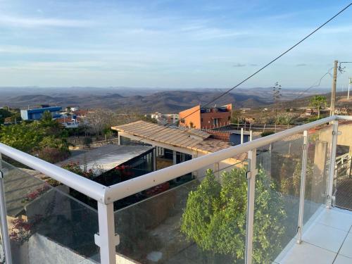 a view from the balcony of a house at Suíte prime in Monte das Gameleiras