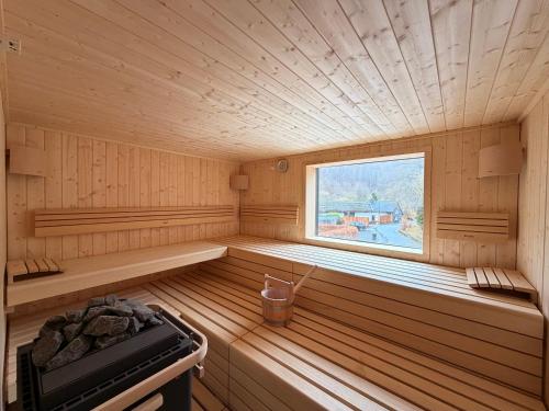 a inside of a sauna with a window at Rurtal de luxe in Simmerath