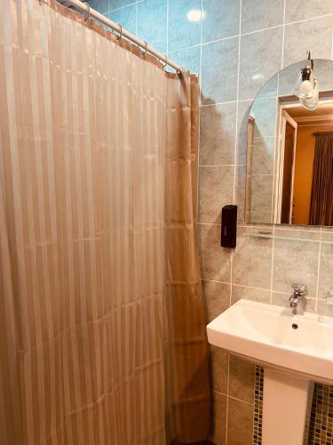 Um banheiro em Eco Yard Inn