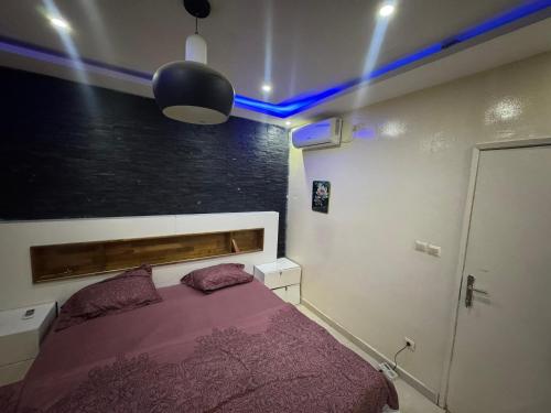 Llit o llits en una habitació de Mahmoud