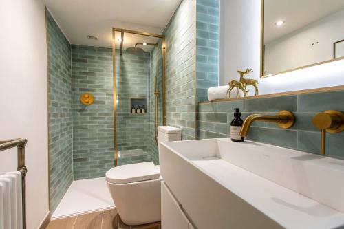 a bathroom with a sink and a toilet and a shower at Old Orchard Elegance - Private Parking in Bath