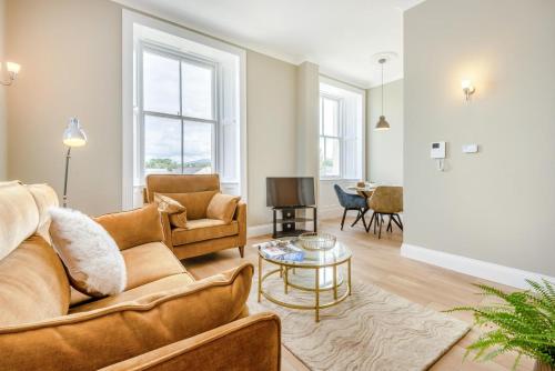 a living room with a couch and a table at 2 Bed in Cockermouth oc-m32942 in Cockermouth