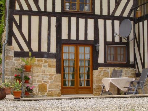 Un patio o zona al aire libre en Chambres d'hotes Le Haut de la Tuilerie