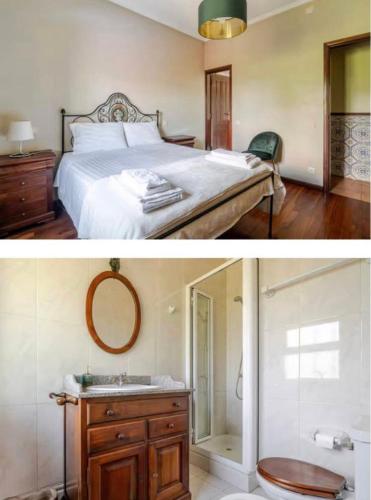 a bedroom with a bed and a sink and a mirror at CASA CAMPO DA FEIRA in Felgueiras