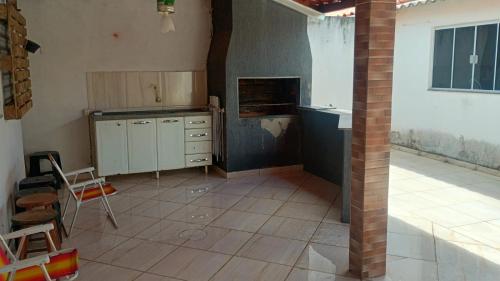 a kitchen with a sink and a counter top at mendes in Água Boa