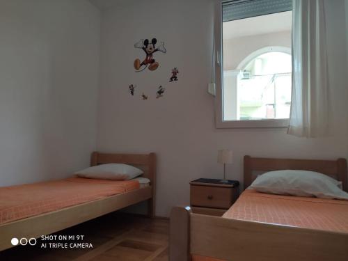 Apartments by the sea Zaboric, Sibenik - 16492