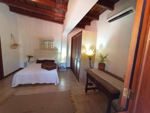 En eller flere senge i et værelse på SalaosPosada