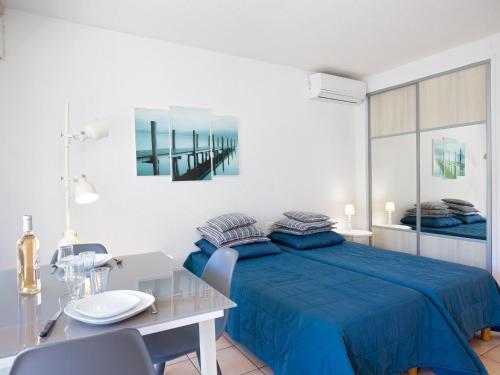 Studio Climatisé Proche Plage et Commerces avec Balcon, Wi-Fi et Parking