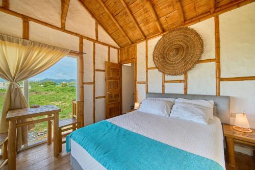 Llit o llits en una habitació de Cabalonga EcoAdventure