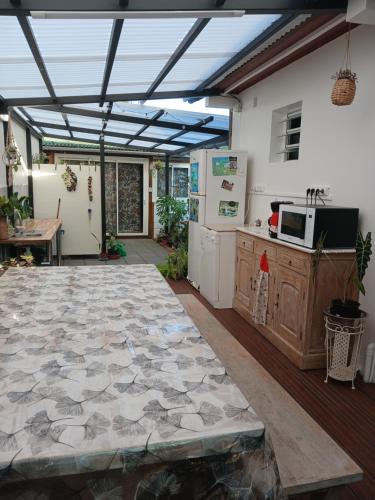 Kuchyň nebo kuchyňský kout v ubytování Ambiance sud sauvage